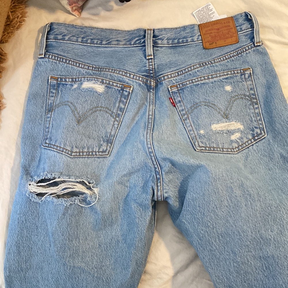 Size 28 Levi’s distressed jean